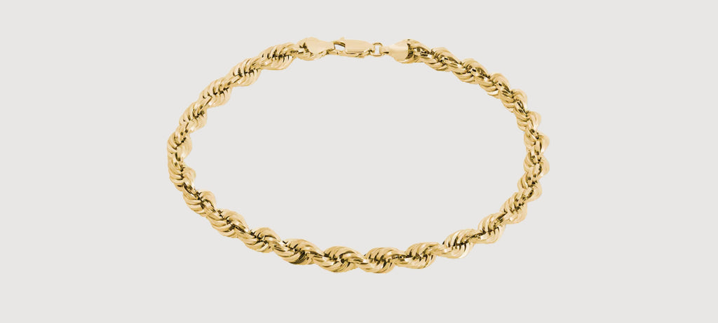 alt="Twisted Rope Design Bracelet in yellow gold"
