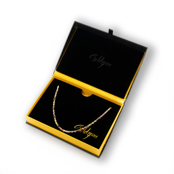 Figarope Chain- 3.5mm - Tricolor Milano - 14k Solid Gold | GOLDZENN- In a box detail of the chain.