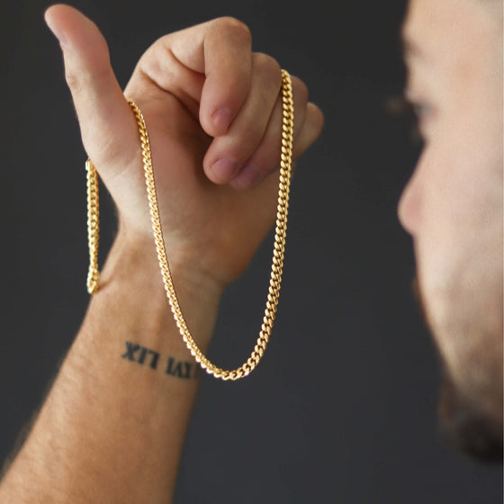 14k Gold Bonded Cuban Link Chain - 5mm| GOLDZENN Jewelry- Chain view while a model holding it.