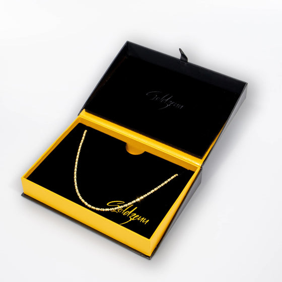 Barrel Link Crystal Chain - 3mm - 14k Gold Bonded| GOLDZENN- In a box view of the chain.
