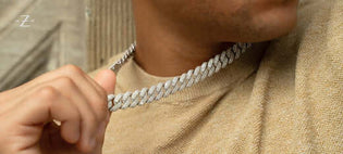  ALT="Why Cuban Link Chains with Diamonds Are the Ultimate Statement Piece A Cuban link chain with diamonds is more than just jewelry—it’s a bold declaration of luxury, success, and personal style. Combining the iconic interlocking design of a Cuban link w