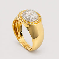 A 0.49 CTW Cluster Round Natural Diamond Ring in 14k yellow gold showcases a wide band and a dome-shaped top encrusted with multiple small natural diamonds, accented by a halo of additional diamonds, displayed against a plain light background.