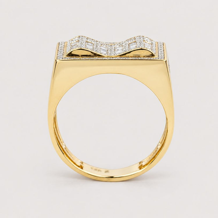 The 0.73 CTW Natural Diamond Cluster Ring in 14k yellow gold features a flat rectangular top with a raised bow-shaped design set with natural diamonds, finished with a plain, smooth band for a sophisticated look.