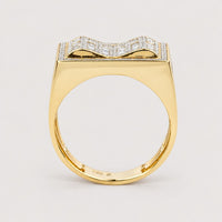 The 0.73 CTW Natural Diamond Cluster Ring in 14k yellow gold features a flat rectangular top with a raised bow-shaped design set with natural diamonds, finished with a plain, smooth band for a sophisticated look.