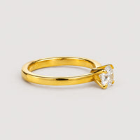 The 0.73ct Round Lab Diamond Solitaire Engagement Ring in 14K Gold features a single round lab diamond in a classic prong setting, making it an elegant choice for women’s engagement rings.