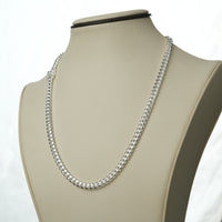 6mm 925 Sterling Silver Cuban link chain displayed on a cream jewelry bust against a white background