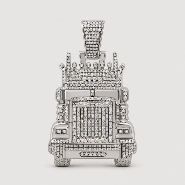 The 1-1/3CTW Diamond Truck Charm in sterling silver is a men’s pendant shaped like a semi-truck, featuring intricate details and natural diamonds—a unique standout accessory.