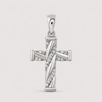 The 1/20 CTW Diamond Cross Pendant in 10K Gold features sparkling diagonal rows of natural diamonds, standing out beautifully against a plain warm off-white studio background.