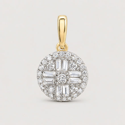 The 1/3 Cttw Diamond Round Baguette Pendant in 10K gold features a cluster of sparkling natural diamonds in round and baguette cuts, with a gold bail, shown against a warm off-white studio background.