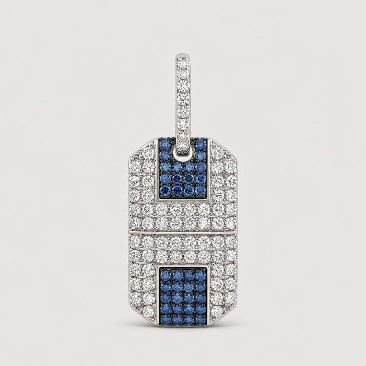 1-5/8CTW Diamond Dog Tag Men's Charm in 10K Gold, featuring a rectangular design with small white stones and blue stone accents, and a top loop for attaching to a chain.