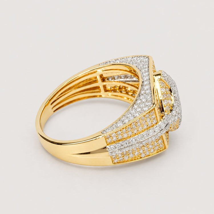 The 1.57 CTW Natural Diamond Cluster Ring in 14k yellow gold features rows of sparkling natural diamonds on the band and around a rectangular center setting, shown against a warm off-white studio background.