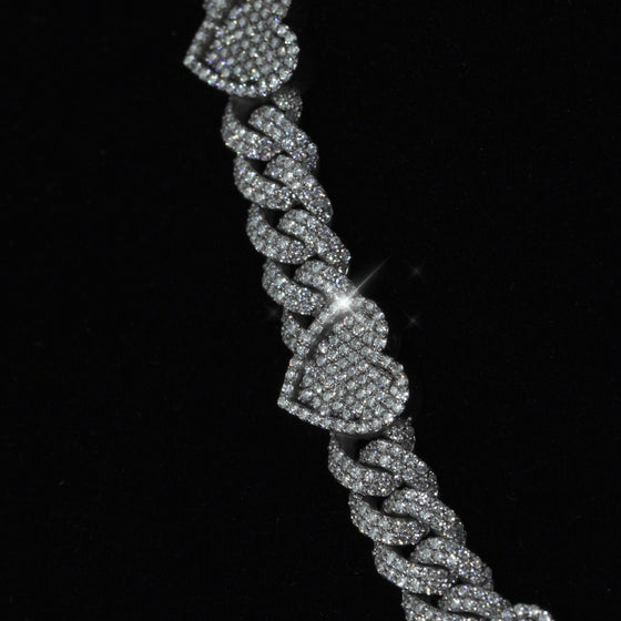 alt=" 10k white gold heart chain featuring 15 CT G+ VS natural diamonds. Elegant, unique, and expertly crafted for timeless luxury and romance. "