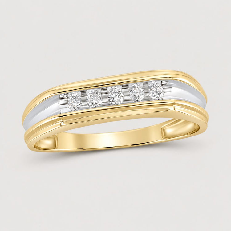 The 10k Two-Tone Gold Diamond Wedding Band – 1/8 Cttw showcases five round diamonds in a row, accented with white gold on top for a classic and timeless style.