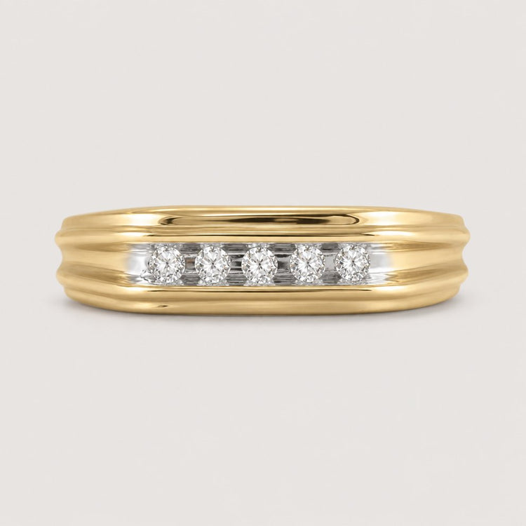 The 10k Two-Tone Gold Diamond Wedding Band – 1/8 Cttw features a grooved design with five round diamonds set in a horizontal row across the center.