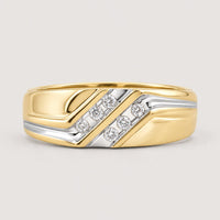 The 10k Two-Tone Gold Diamond Wedding Band – 1/8 Cttw features a polished finish, diagonal silver accents, and five small round diamonds set in a row within the silver section, displayed on a warm off-white studio background.
