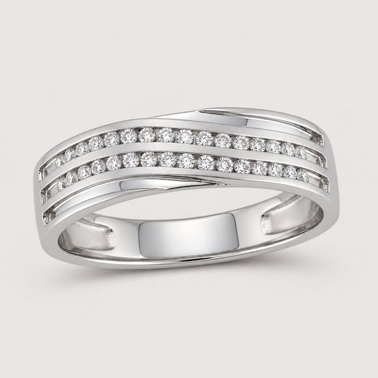 The 10k White Gold Diamond Wedding Band Ring 1/4 Cttw features three parallel rows of small round diamonds set atop a sleek band with polished edges, offering a modern, elegant look—ideal as an anniversary ring.