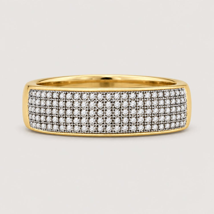 The 10k Gold Round Diamond Wedding Band Ring 3/8 Cttw features a wide band with multiple rows of closely set sparkling diamonds, making it an ideal anniversary or wedding ring.