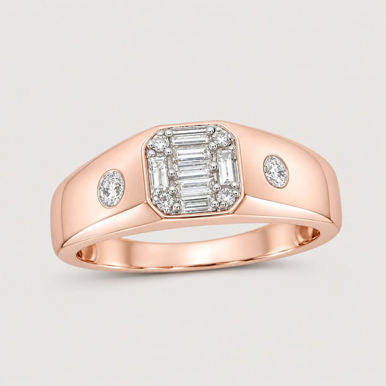 The 10k Gold Baguette Diamond Band Ring 3/8 Cttw features a rose gold band with a central cluster of baguette and round diamonds, plus an additional round diamond on each side for extra sparkle.
