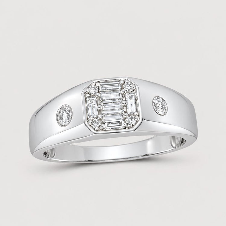 The 10k Gold Baguette Diamond Band Ring 3/8 Cttw features a rectangular cluster of baguette-cut diamonds with round diamonds on each side, all set in a wide polished band—ideal as a wedding band or statement ring.