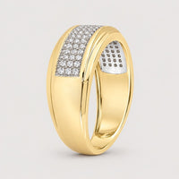 The 10K Yellow Gold Diamond Band Ring 1/3 Cttw features a wide band with a rectangular section adorned with rows of sparkling diamonds on the top and partially inside the band.