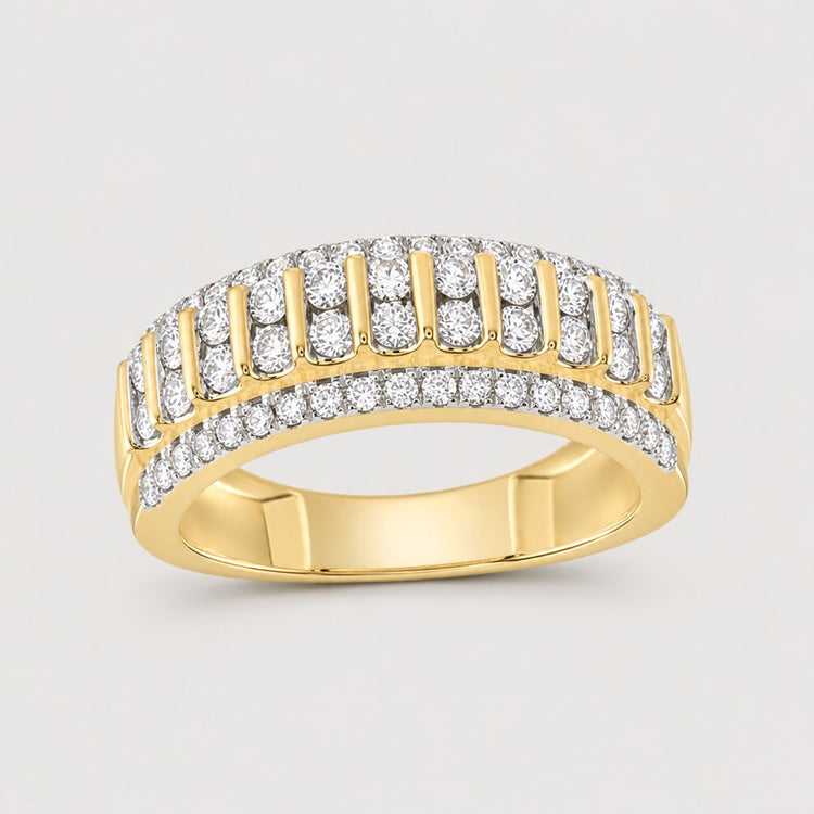 The 10k Yellow Gold Diamond Band Ring 1 CT features two rows of sparkling round diamonds along the edges and a center row of vertical diamond segments, offering a bold and elegant look—perfect as an anniversary ring.
