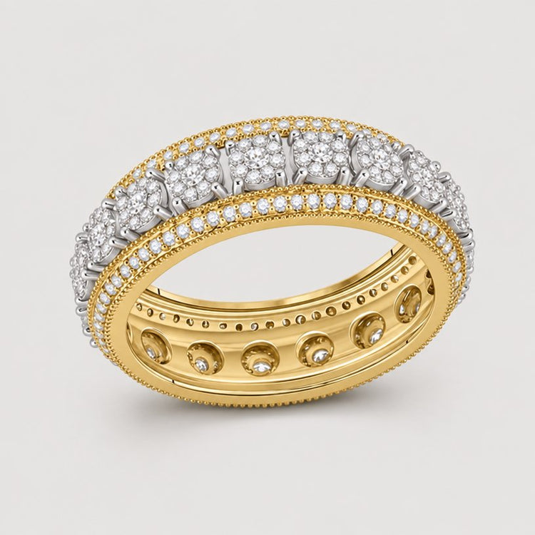 The 10k Yellow Gold Diamond Cluster Band Ring 1-1/4 Cttw features sparkling round diamonds set in intricate patterns along the band, accented with detailed beading and filigree for a timeless, elegant look.