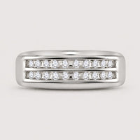 The 10k Gold 2-Row Diamond Wedding Band – 1/4 Cttw features two parallel rows of channel-set diamonds for a sleek, modern look, shown against a plain warm off-white studio background.