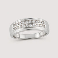 A sleek and modern 10k Gold 2-Row Diamond Wedding Band – 1/4 Cttw gleams against a plain warm off-white studio background, featuring two horizontal rows of channel-set diamonds.