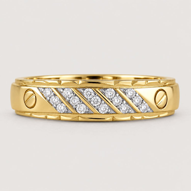 The 10K Yellow Gold 1/5 CTW Diamond Wedding Band features diagonal rows of small round diamonds set in the center with two screw-like accents on each side, shown against a warm off-white studio background.