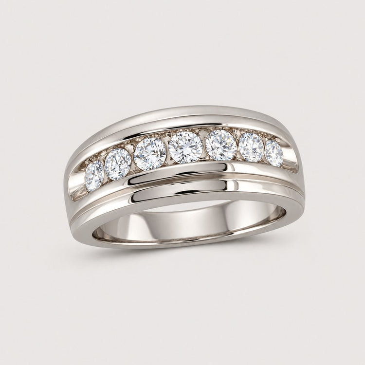 The 10k Gold Diamond Channel-Set Wedding Band Ring showcases seven round-cut diamonds totaling 1 carat, set in a wide, polished band of gold.