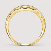The 10k Gold Diamond Scalloped Wedding Band 1/5 Cttw features a smooth, polished finish and a subtle wavy scalloped edge, shown from the side against a warm off-white studio background.