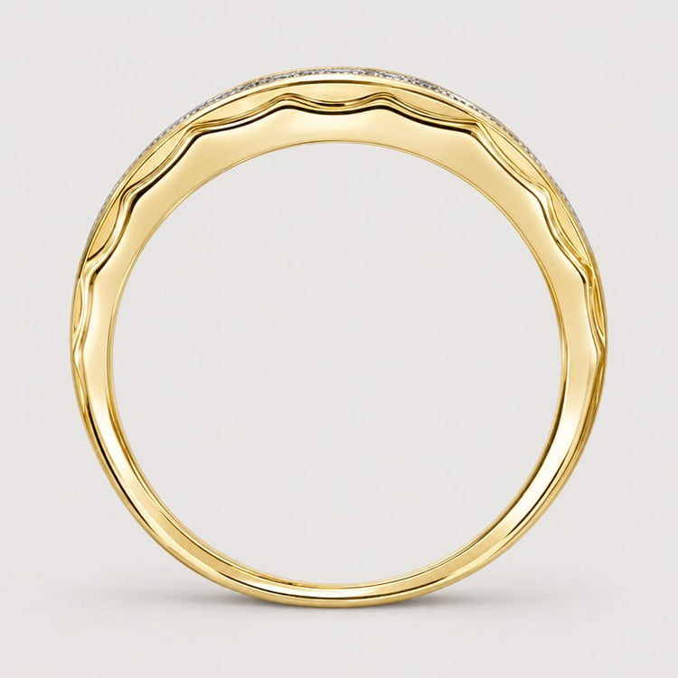 The 10k Gold Diamond Scalloped Wedding Band 1/5 Cttw features a smooth, polished finish and a subtle wavy scalloped edge, shown from the side against a warm off-white studio background.