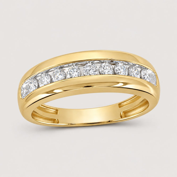 The 10k Gold Round Diamond Wedding Band 1/2 Cttw displays a row of round white diamonds in a channel setting across the top, shown on a warm off-white studio background.