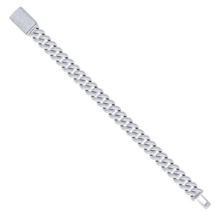 The Silver Moissanite Cuban Link Bracelet - 12mm features a rectangular, textured clasp and is displayed diagonally on a white background.