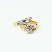 The 1/3 CTW 10k Yellow Gold Wedding Trio Set features twisted bands with small embedded diamonds and a ring highlighted by a square diamond cluster, shown against a white background.