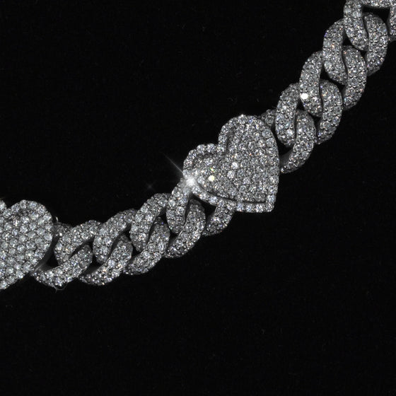 alt=" 10k white gold heart chain featuring 15 CT G+ VS natural diamonds. Elegant, unique, and expertly crafted for timeless luxury and romance. "