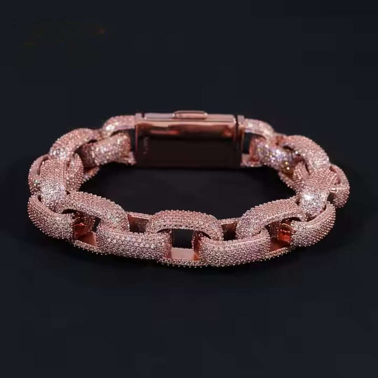 The Silver Moissanite Bracelet Rose Gold -13mm features a rose gold chain-link design with sparkling Moissanite stones, showcased on a solid black background.