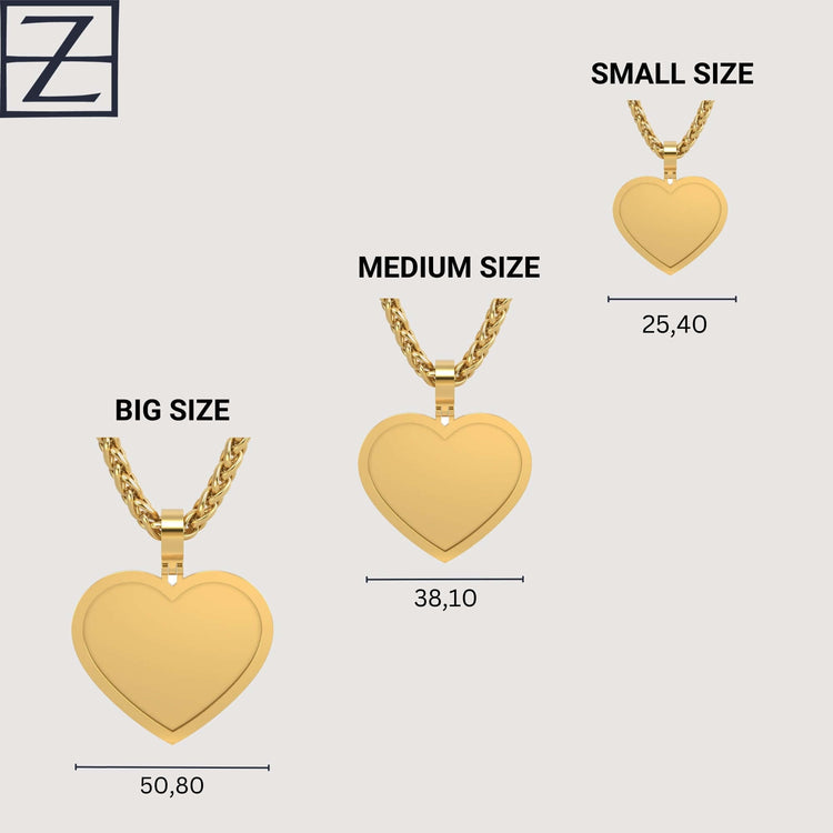 Three 14K Gold Classic Heart Picture Pendants in small (25,40), medium (38,10), and big (50,80) sizes are shown on chains against a light backdrop featuring a blue Z logo in the top left corner.