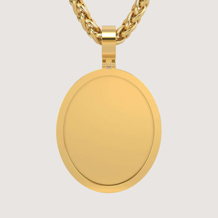 A close-up of the 14K Gold Classic Oval Picture Pendant, featuring a smooth, polished 14K gold surface on a thick chain, shown against a plain light background with no engraving or decoration.