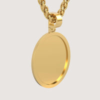 A close-up of the 14K Gold Classic Oval Picture Pendant showcases its blank oval face, hanging from a thick gold chain against a plain light background.
