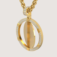 The 14K Gold Diamond-Accented Round Picture Pendant features a rotating charm with diamond accents on the rim, displayed against a plain light background.
