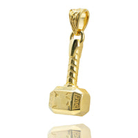 The 14k Solid Gold Hammer Pendant is shaped like Thor’s Mjölnir and crafted in 14K solid gold, featuring intricate designs and a detailed bail—an exceptional addition to any jewelry collection.