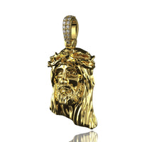 The 14K Gold Jesus Face Pendant with Diamond Bail features a detailed Jesus head and crown of thorns design, shown against a white background.