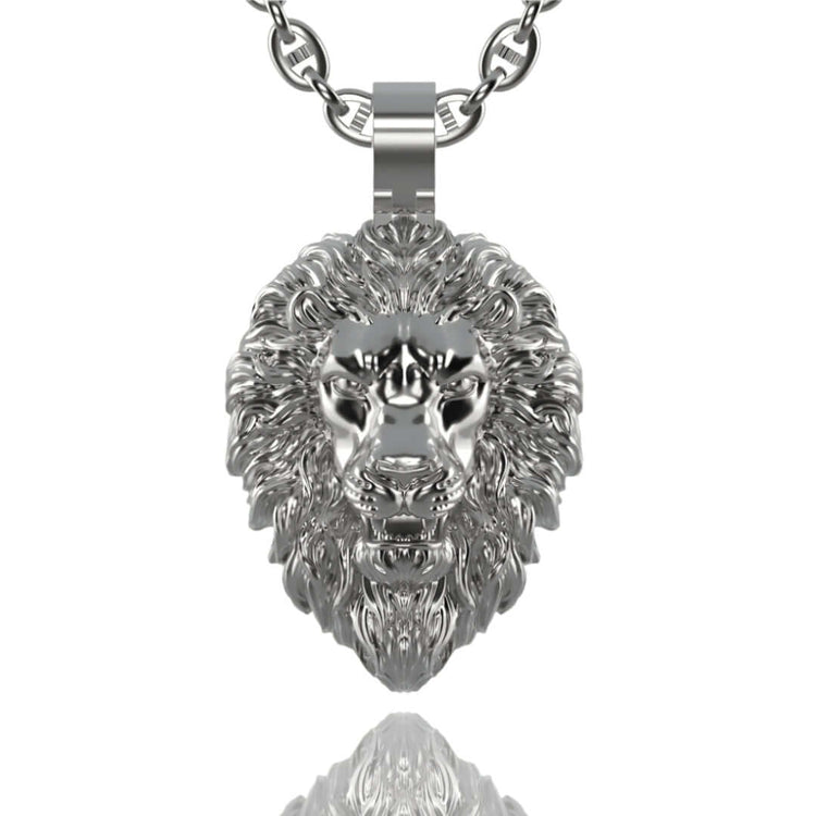 A 14k gold lion head pendant features intricate fur and facial detailing, reflecting light on its polished surface and delivering a bold, regal look.