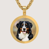 The 14K Gold Modern Grooved Round Picture Pendant showcases a smiling Bernese Mountain Dog on a light background, making it a stylish and personal necklace.