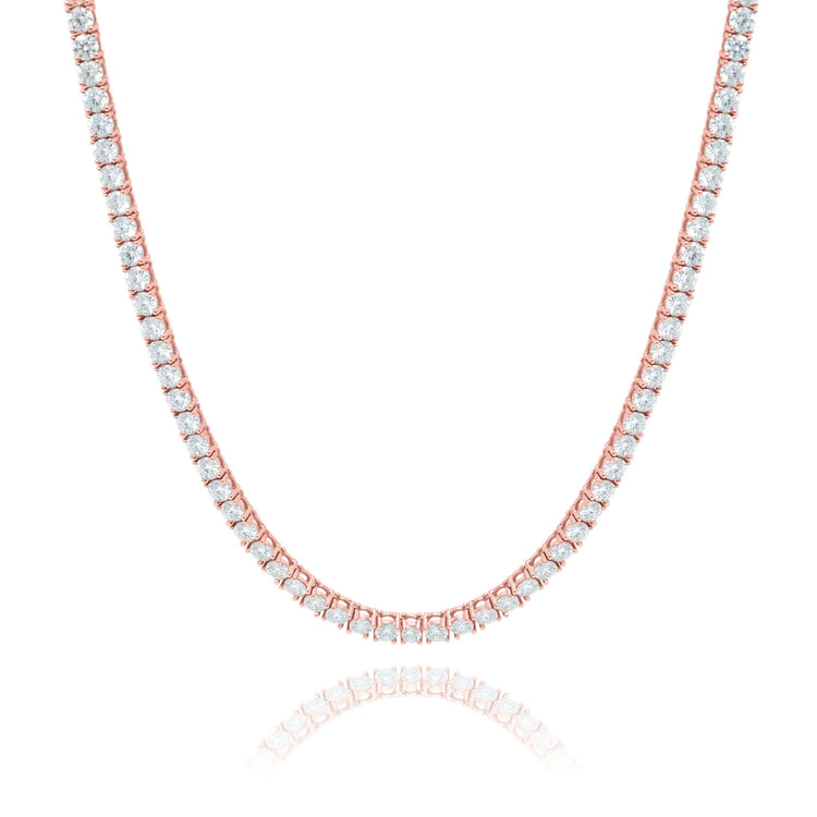 The Tennis Chain - 14K Gold Moissanite showcases round white moissanites set in rose gold, radiating ethical luxury and brilliance with each gemstone evenly placed along the chain for a dazzling effect.
