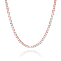 The Tennis Chain - 14K Gold Moissanite showcases round white moissanites set in rose gold, radiating ethical luxury and brilliance with each gemstone evenly placed along the chain for a dazzling effect.
