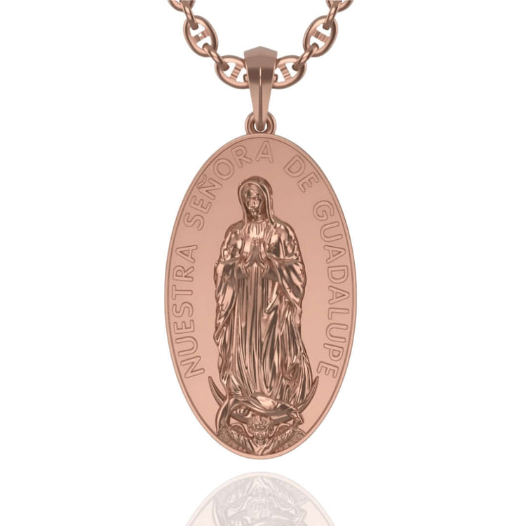 Oval rose gold pendant engraved with the Virgin Mary and “NUESTRA SEÑORA DE GUADALUPE” around the edge—a timeless 14k Gold Nuestra Virgen de Guadalupe Pendant.