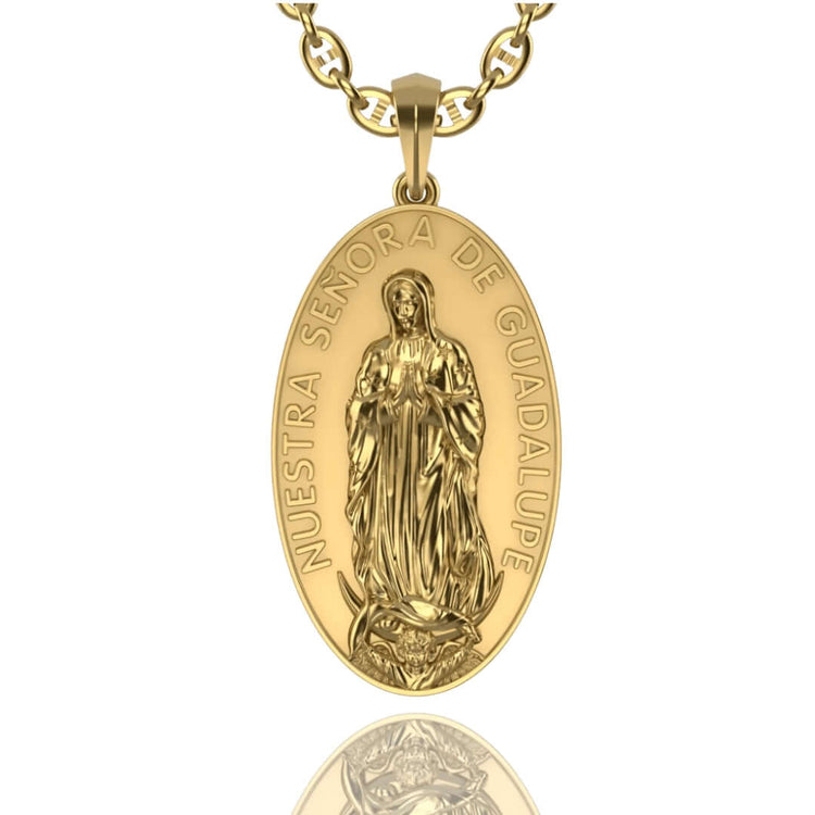 The 14k Gold Nuestra Virgen de Guadalupe Pendant features an engraved Virgin Mary image with "NUESTRA SEÑORA DE GUADALUPE" inscribed around the border—a beautiful tribute to Our Lady of Guadalupe.