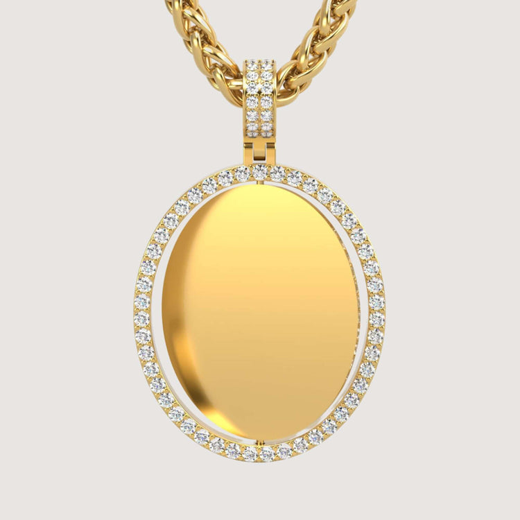 The 14K Gold Open Oval Diamond Picture Pendant features a smooth gold oval bordered with sparkling diamonds, suspended from a textured gold chain against a plain light background.